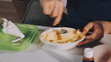 step by step. preparing homemade vanilla ice cream with chocolate sauce.