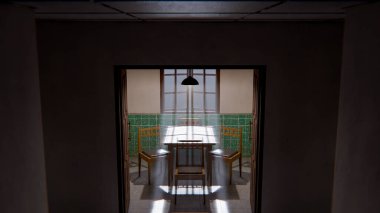 Minimalist bir bekleme odasının 3 boyutlu portresi. Ahşap sandalyeler, masa, pencere ışığı ve yeşil fayanslı duvarlar. Modern dijital çevre sanatı.