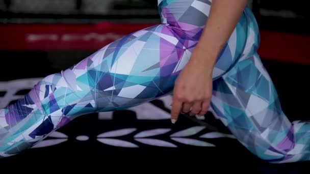 Young woman sits on the twine in the gym. — Stock Footage Young woman sits on the twine in the gym. Stock Footage