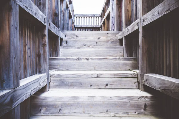 Old wooden staircase worn by time