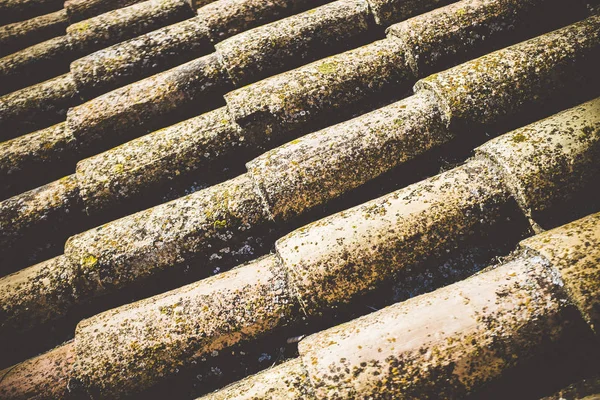 Old roof of artisan tiles of mediterranean style