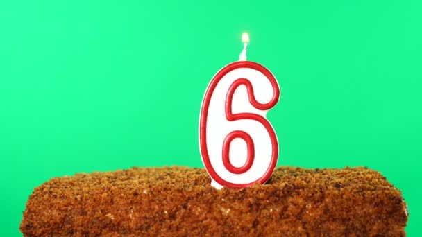 Cake with the number 6 lighted candle. Chroma key. Green Screen. Isolated — Stock Video