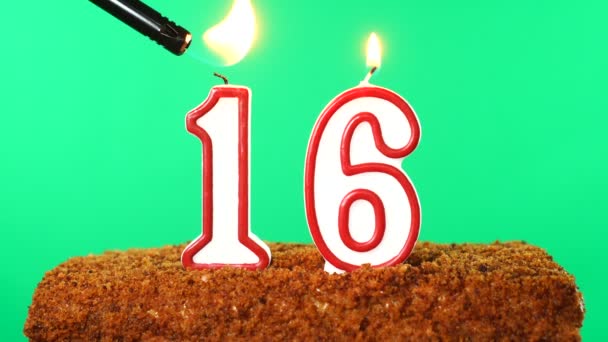 Cake with the number 16 lighted candle. Chroma key. Green Screen. Isolated — Stock Video