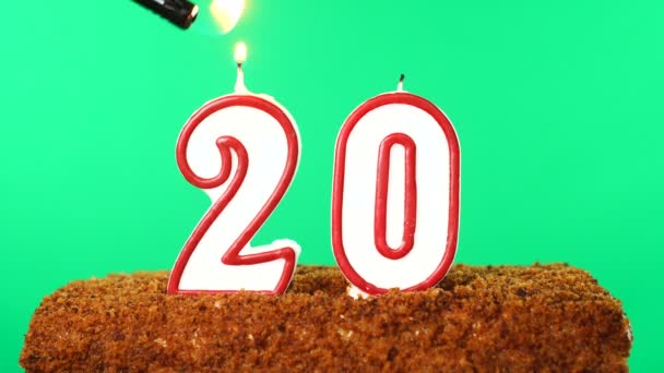 Cake with the number 20 lighted candle. Chroma key. Green Screen. Isolated — Stock Video