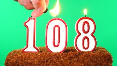 Pasta ve 108 numaralı mum. Krom anahtar. Yeşil Ekran. İzole edilmiş