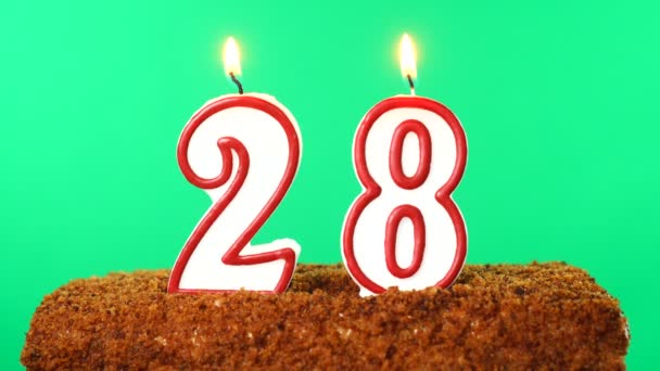 Cake with the number 28 lighted candle. Chroma key. Green Screen. Isolated — Stock Video