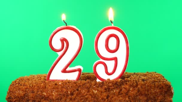 Cake with the number 29 lighted candle. Chroma key. Green Screen. Isolated — Stock Video