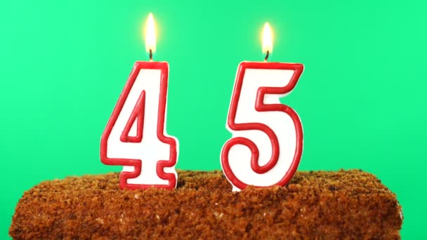 Cake with the number 45 lighted candle. Chroma key. Green Screen. Isolated — Stock Video