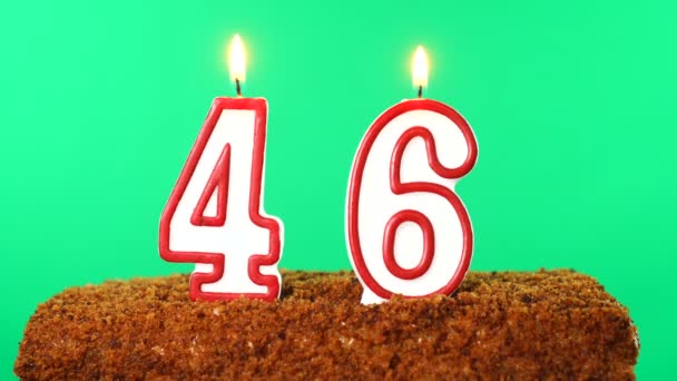 Cake with the number 46 lighted candle. Chroma key. Green Screen. Isolated — Stock Video