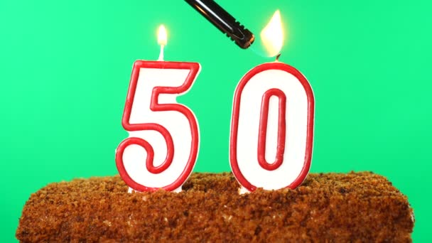 Cake with the number 50 lighted candle. Chroma key. Green Screen. Isolated — Stock Video