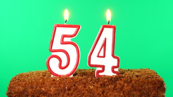 Cake with the number 54 lighted candle. Chroma key. Green Screen. Isolated — Stock Video