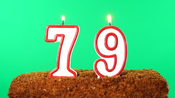 Cake with the number 79 lighted candle. Chroma key. Green Screen. Isolated — Stock Video