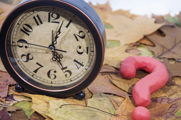 Daylight Saving Time. Wall Clock going to winter time. Autumn abstraction. Fall back time.