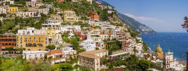Italy. View of the town and the seaside on sunny summer day clipart