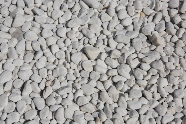 Białe kamienie, białe tło, białe kamienie dekoracyjne, kamienie akwariowe, kamienie do ogrodu — Zdjęcie stockowe