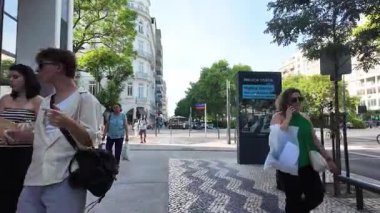 Summer Lisbon Portugal POV photo old houses tiled walls bright streets tourism lifestyle