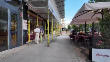 Lisbon Portugal summer POV street photo narrow alleys tiled houses tourism lifestyle