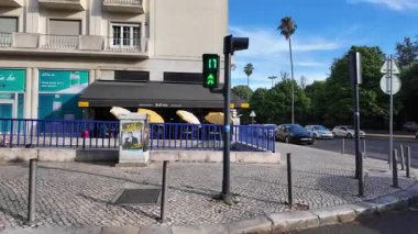 Lisbon old district summer POV walking photo with urban architecture European vibe