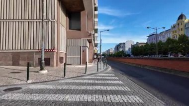Lisbon Portugal POV walking summer lifestyle in old town with bright houses