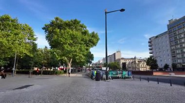 POV Lisbon summer day walk with traditional Portuguese architecture houses