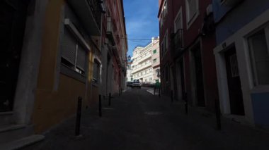 Lisbon Portugal POV city walk through historic streets with summer sun and travel life