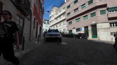 Summer POV stroll Lisbon city old neighborhood historic architecture European vacation