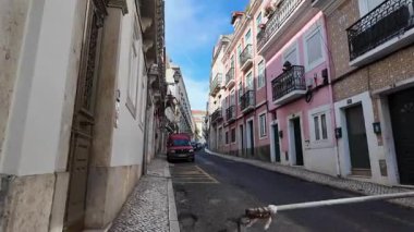 Lisbon Portugal summer POV walk with historic alleys old town architecture and travel vibe