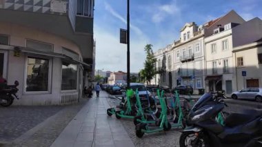 POV Lisbon old city summer walk with cobblestones and architecture vibe