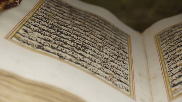 Ancient arabic text manuscript written in a book