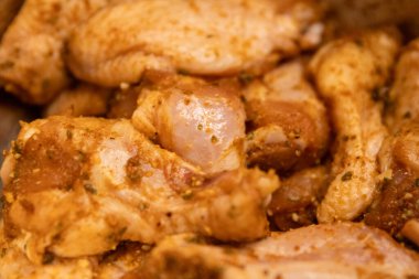 Seasoned Raw Chicken Wings marinating