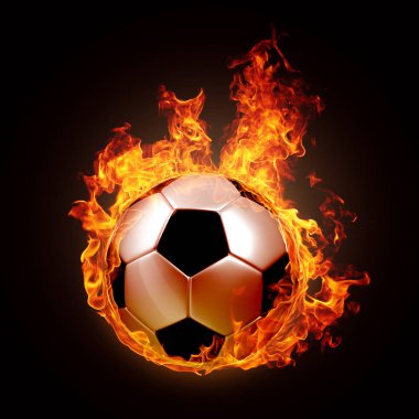  Futbol topu ateşe karşı siyah arka plan.