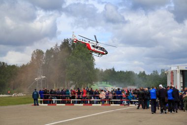 NOGINSK, RUSSIA - JUNE 06, 2018. Helicopter RA-01886 as air ambulance during the international exhibition Complex Safety-2018. Noginsk Rescue Center of the Ministry of emergency situations, Moscow region, Russia. clipart