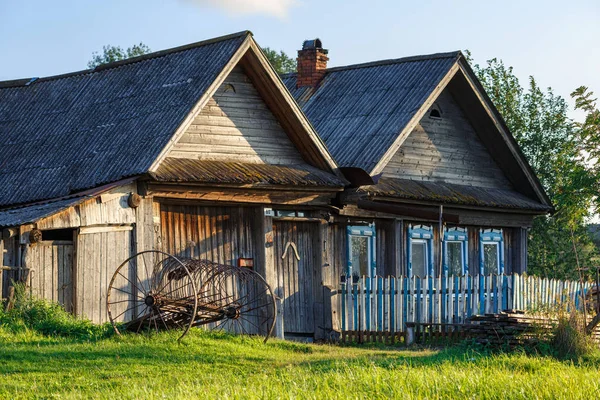 Old country house in summer. Village of Visim, Sverdlovsk region, Russia.