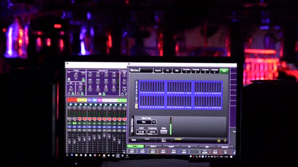 Wide shot of lighting control system display in concert. — Stock Video