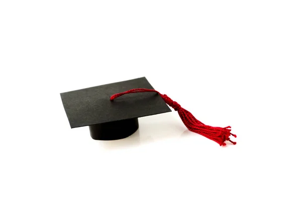 Ένα Καπάκι Αποφοίτηση Λευκό Φόντο — Φωτογραφία Αρχείου