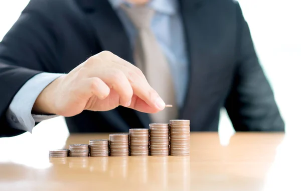 stock image Close-up Of A Businessman Making Stack Of Coins