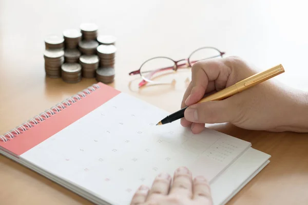 Close up hand writing in calendar plan concept. — Stock Photo, Image