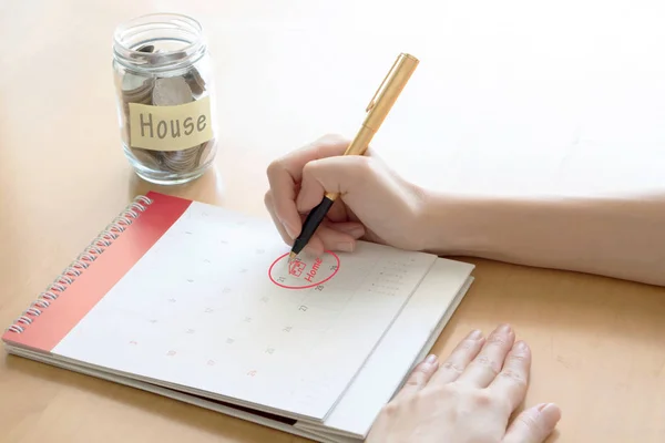 Hand writing in calendar plan concept. Home — Stock Photo, Image