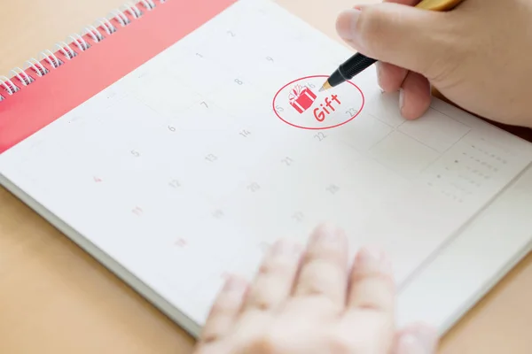 Hand writing in calendar plan and coins concept, Gift — Stock Photo, Image