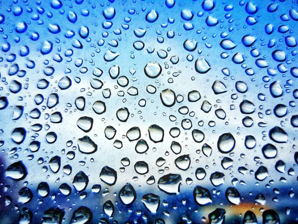 Wet window water drops background