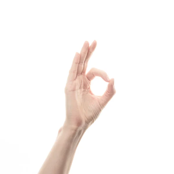 Hand van jong meisje op witte achtergrond — Stockfoto