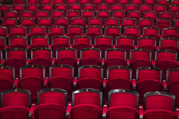 Red seats in a empty theater and opera.