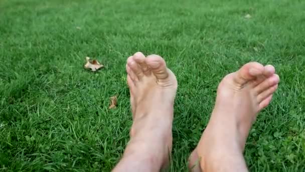 Male Foot Green Grass — Stock Video
