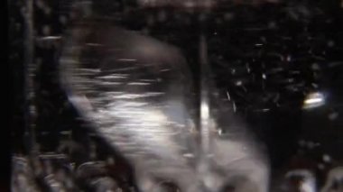 Bir fincan çaya şeker karıştırıyorum.