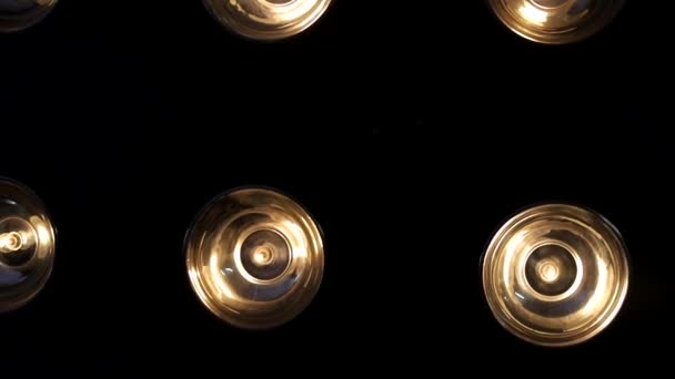Background with light bulbs on a black background — Stock Video