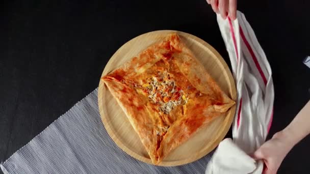 Woman prepping meal scene for a shoot on a wooden board — Stock Video