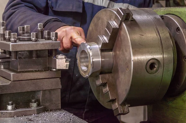 Heavy industrial worker operator working with lathe machine — Stock Photo, Image