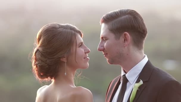 Close-up shot of a kiss on a sunset — Stock Video