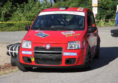 A Fiat Panda racing car during a timed trial of the Golfo dei Poeti Rally that took place in La Spezia on 2 July 2017. clipart