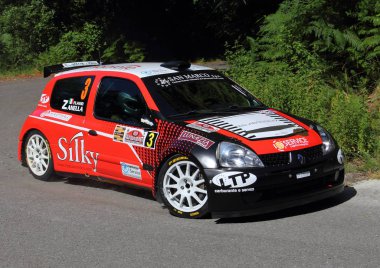 A Renault Clio Williams racing car during a timed trial of the Golfo dei Poeti Rally that took place in La Spezia on 2 July 2017. clipart